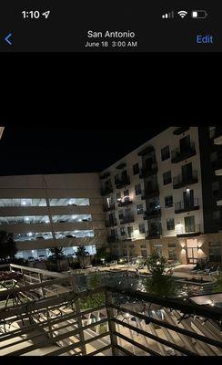 Picture taken at 3 am of people being in the pool area.