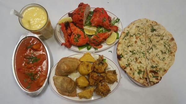 Mango Lassi , Naan, Vegetarian Platter,  Chicken Tandoori  ..