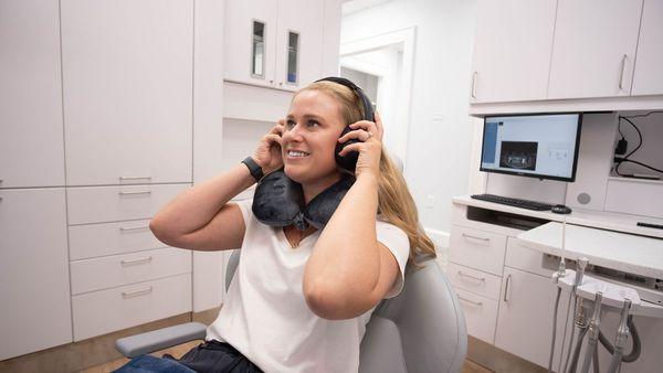 Patient getting comfortable with the amenities available at Gower Family Dentistry