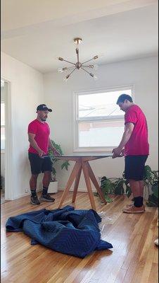 Moving a glass table top