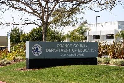 This signals the entrance to the Orange County Department of Education.