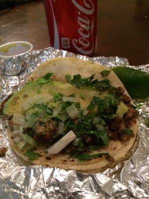 Beef fajita on corn tortilla with avocado, diced onion, fresh cilantro n lime, salsa verde and a coke! #foodporn