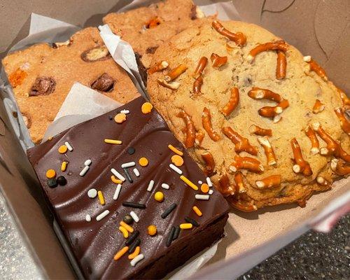 Two Halloween Treat Blondies, a Fudge Brownie and a Salted Caramel Cookie