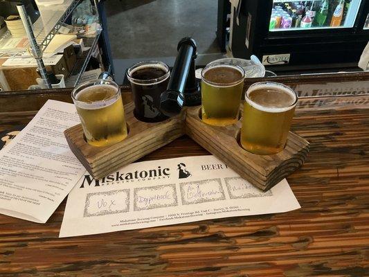 Flight at bar in taproom.