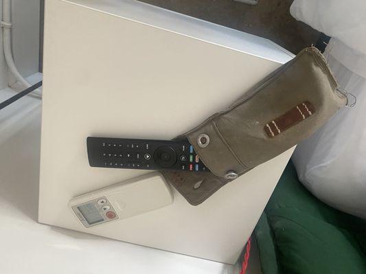 Remote co trim and AC remote holder