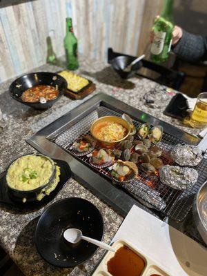 Steamed egg, mayonnaise corn, scallops, clams, mussels, oysters, and marinated scallops