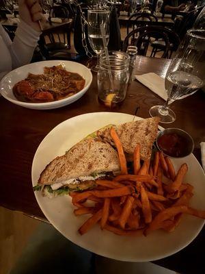 Grilled Swordfish sandwich with sweet potato fries and Short Rib Ravioli