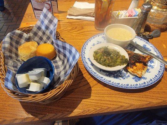 Smoky seasoned chicken with turnip greens, grits, and cornbread + biscuit