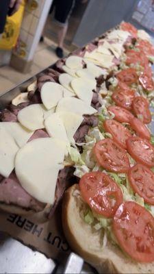 6 foot platter sandwiches  with fresh veggies