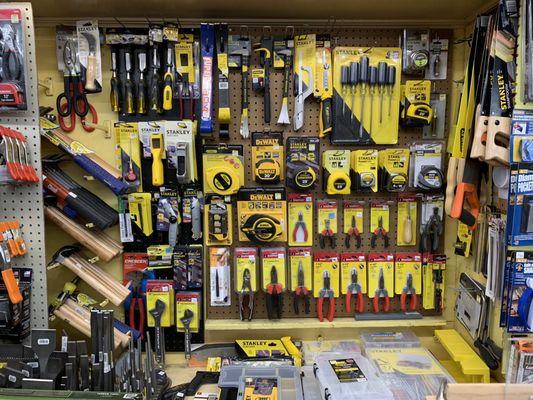 Collection of Stanley Tools, Estwing Hammers, and an assortment of tape measures.