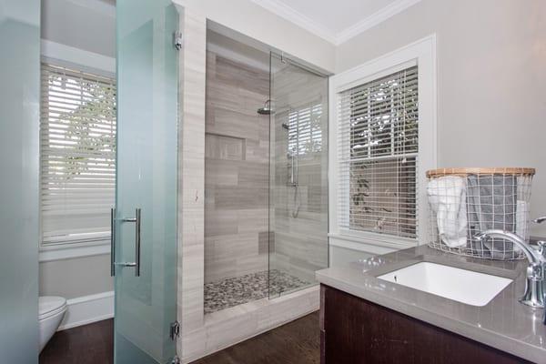 We created this stunning, contemporary bathroom where there was only dead space.