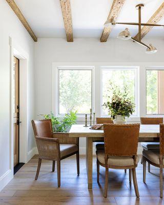 We added warmth and character with wood beams in this dining room addition