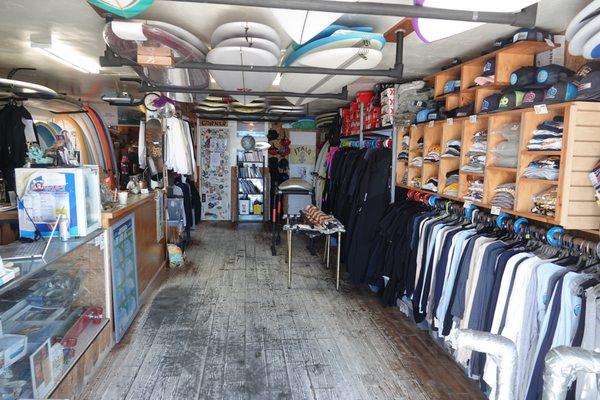 We have a full surf shop along with a bathroom, changing room, storage for personal items, and an outdoor hot shower.