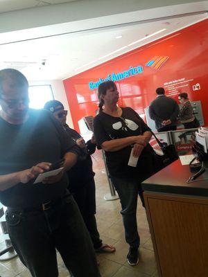 Horrible Service!!!! 1 teller, line to the door!!!! What is up with all the Bank Of Americas????