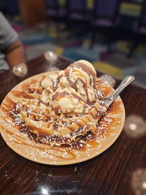 Waffle with ice cream, caramel and fudge