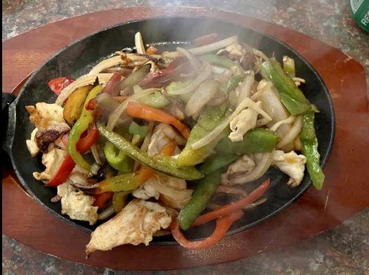 Chicken fajitas-served with tortillas and a side of black beans and rice