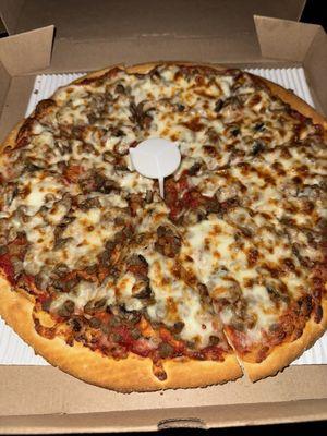 12" thin crust with hamburger, ground sausage and mushrooms.