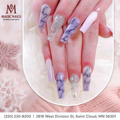 Embrace the magic of winter with enchanting glitter butterflies on your nails, adding a touch of whimsy and sparkle to your seasonal look.