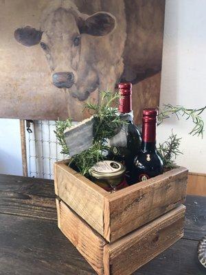 A recent gift package with Amphora Nueva olive oil, vinegar and olives in a Farmyard Darlings wooden box.