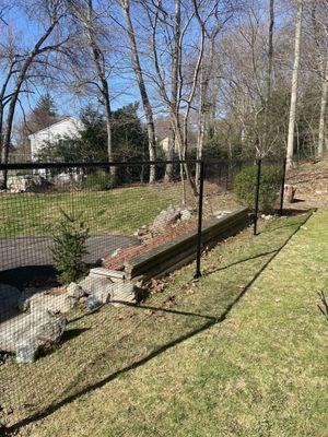 Weld wire and metal pole fence