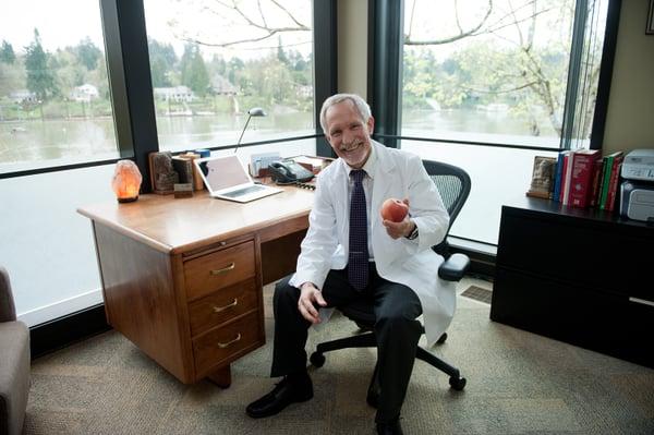 Dr. Peterson in his office overlooking the water.