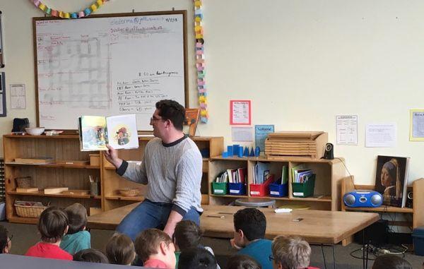 An FHM Montessori classroom read aloud with Upper El students.