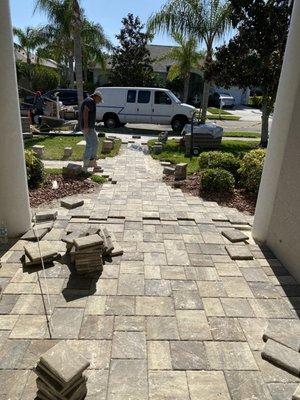 This is our front door entrance. Smaller pavers on over the top of the existing surface.