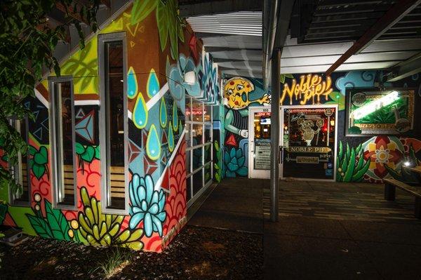 Exterior shot of Noble Pie Parlor in Midtown District Reno. Mural by local Reno artist Anthony Ortega.