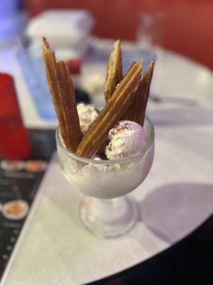 Strawberry cheesecake ice cream and Bavarian cream stuffed churros