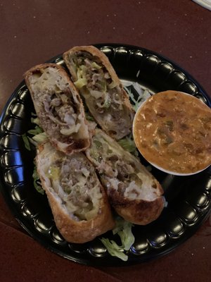 Steak & cheese egg rolls