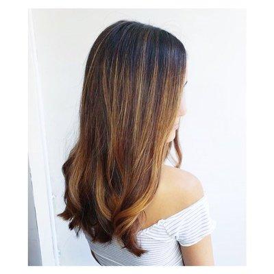 Soft and natural caramel balayage by Eden.