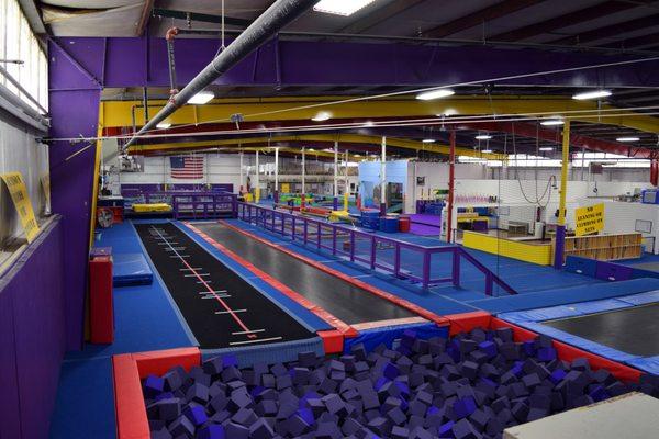 Gymsport Tramp Zone - 60 foot TumblTrak Trampoline and 60 foot fiberglass rod tumbling floor with loose foam pit landing