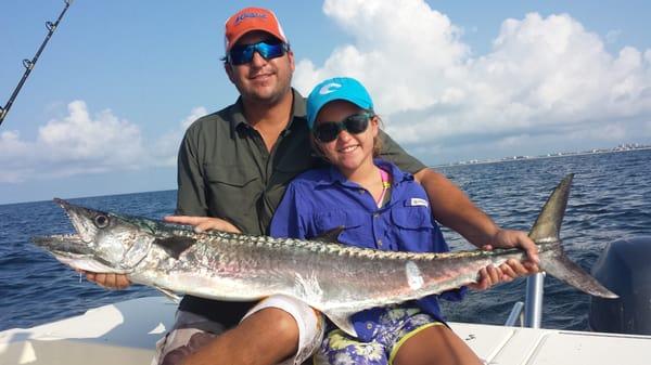 Father and Daughter show off their catch