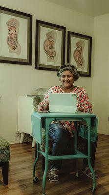 Midwife Varshna in the prenatal visit room.