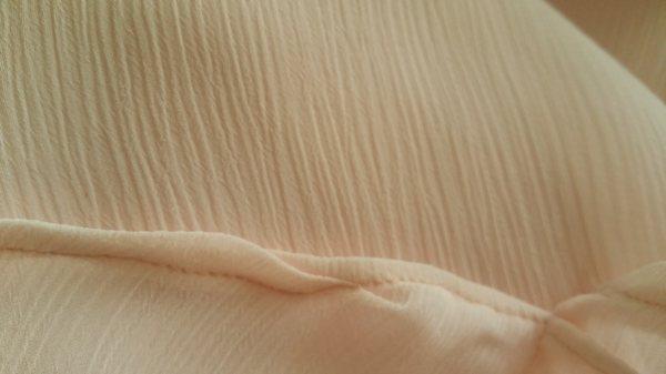 This is the quality of the work that was done on my dress when I took it in for alterations. Uneven seams and puckers.