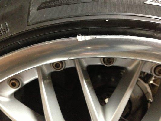 BMW RIM DAMAGED