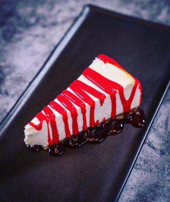 Cheesecake with strawberry drizzle