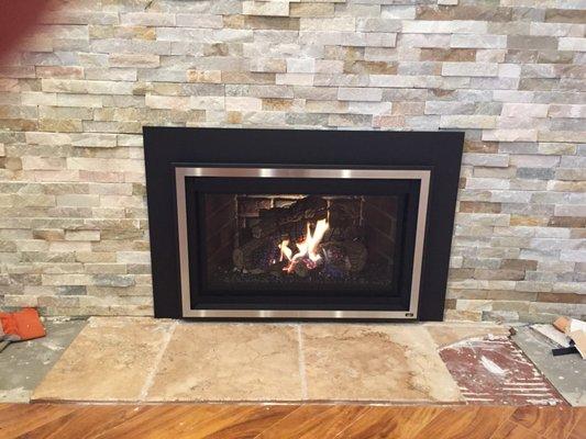 FPX 32 DVS with Ember Fyre burner, handmade brick liner, and Lopi Profile front in Stainless Steel.