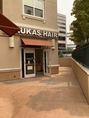 Located in a hidden pocket along the pedestrian walkway. Entrance is facing S. De Anza Blvd.