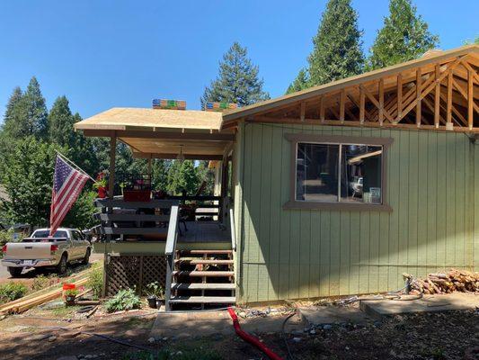 New trusses and sheathing - ready for roofing.