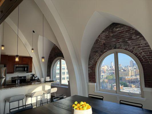 Kitchen and dining area in a 2BR suite.