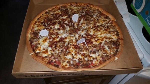 All meat pizza with traditional crust and extra cheese.