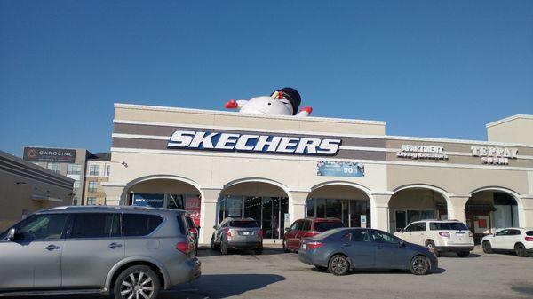 Santa snowman says "ah... I'm deflated" on the roof