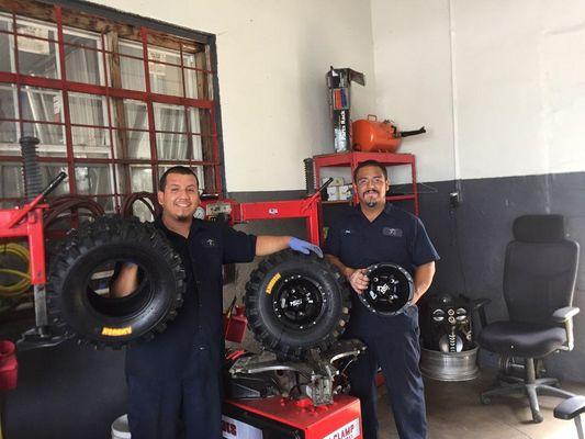 Our tire techs showing that we also carry tires for different needs!!!