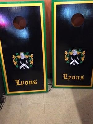 corn hole set with family creast