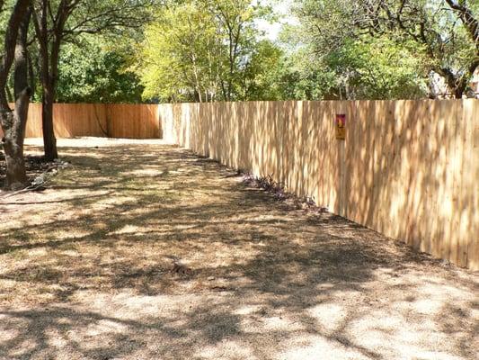 Part of 190 ft fence using 3/4 inch #2 grade cedar pickets