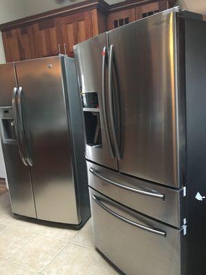 Two broken fridges left uninstalled in the middle of the kitchen.  Worst service ever.