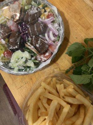 Falafel salad with the works and perfectly crispy French fries