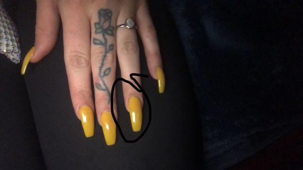 The circled nail is the desired length. Also is the longest nail as you can see.