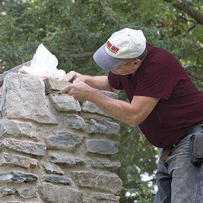 Stone masonry chimney repair